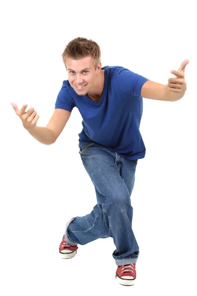 Handsome young man dancing isolated on white Stock Image