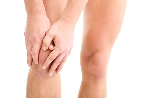 Young man with knee pain, isolated on white — Stock Photo, Image