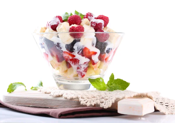 Fruit salad in glass bowl, isolated on white — Stock Photo, Image