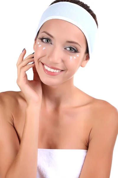 Hermosa chica hidratante crema facial primer plano aislado en blanco —  Fotos de Stock
