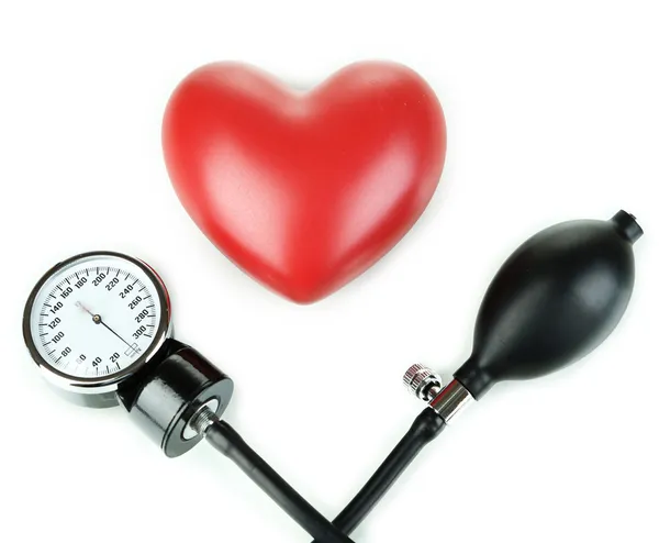 Tonometer ve üzerinde beyaz izole kalp — Stok fotoğraf