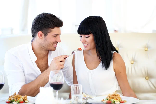 Beautiful couple having romantic dinner at restaurant — Stock Photo, Image