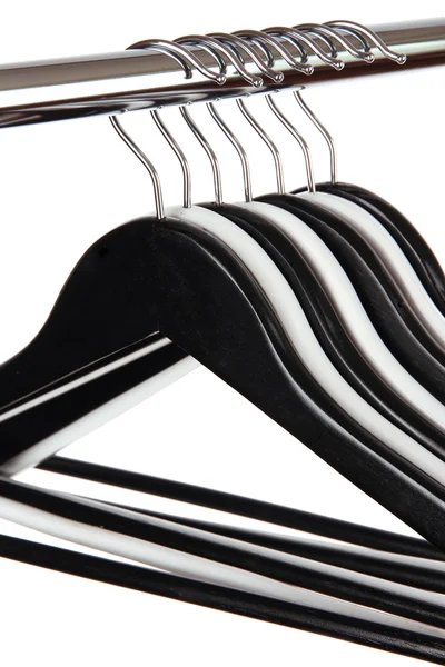 Cabides de roupas preto e branco isolados em branco — Fotografia de Stock