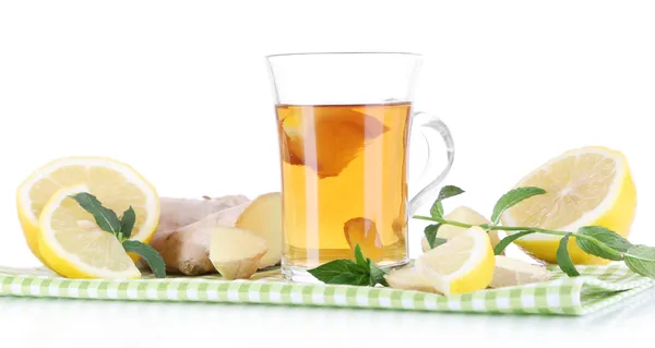 Cup of tea with ginger on napkin isolated on white — Stock Photo, Image