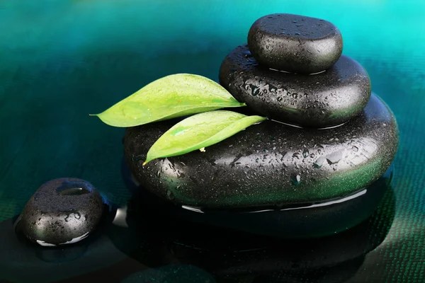 Wellness stones in water close-up — Stockfoto