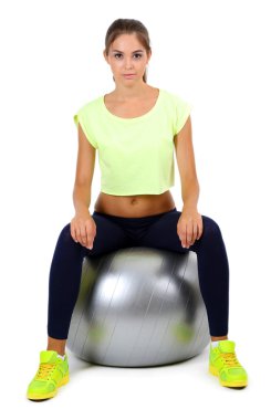 güzel genç kız üzerinde beyaz izole egzersizleri yapıyor