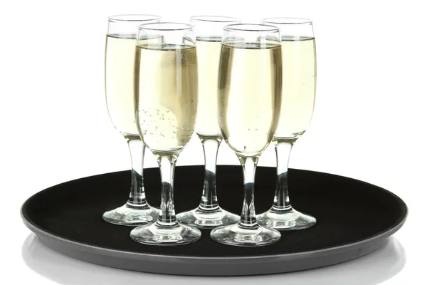 Viele Gläser Champagner auf dem Tablett, isoliert auf weiß — Stockfoto