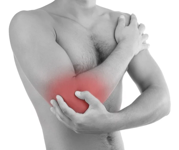 Young man with hand pain, isolated on white — Stock Photo, Image