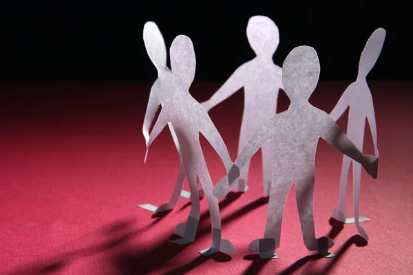 Paper people in social network concept on dark background — Stock Photo, Image