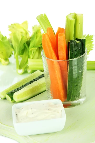 Fresh green celery with vegetables in glass close-up — Stock Photo, Image