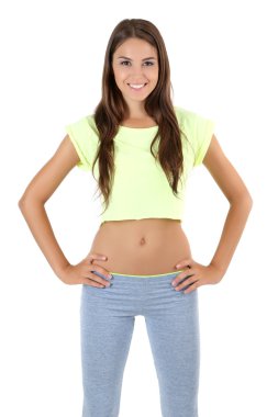 güzel genç kız üzerinde beyaz izole egzersizleri yapıyor