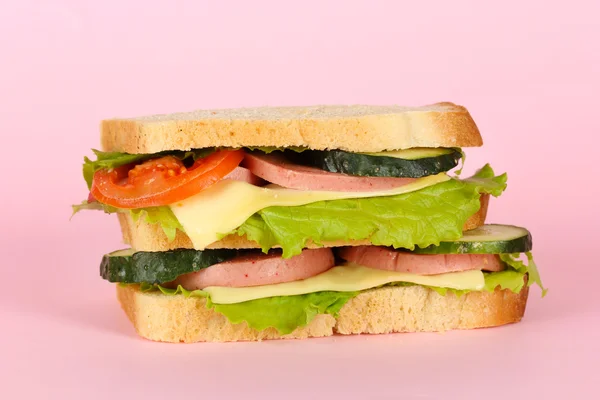 Sandwich on pink background — Stock Photo, Image