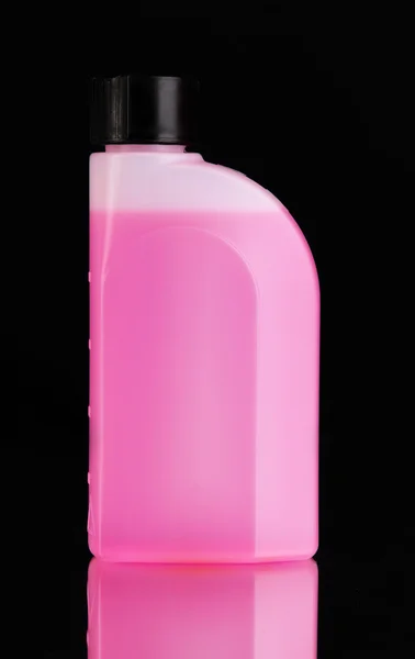 Pink liquid for car in canister on black background — Stock Photo, Image