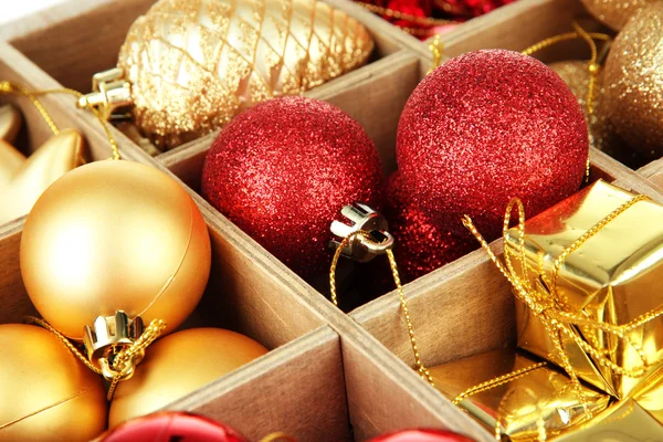 Wooden box filled with christmas decorations background — Stock Photo, Image