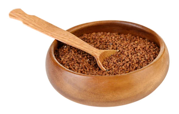 Buckwheat groats in bowl and wooden spoon isolated on white — Stock Photo, Image