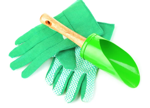 Pequeña pala de jardinería y guantes aislados en blanco —  Fotos de Stock