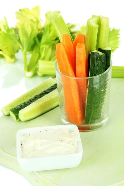 Fresh green celery with vegetables in glass close-up — Stock Photo, Image