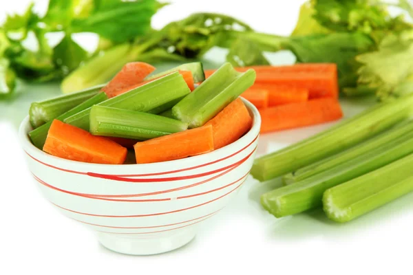 Fresh green celery with vegetables in bowl isolated on white — Stock Photo, Image