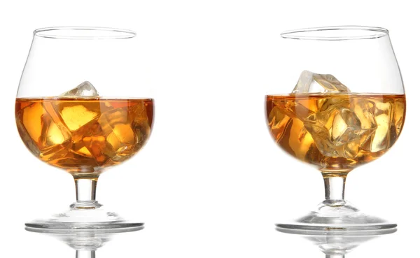 Brandy glasses with ice isolated on white — Stock Photo, Image