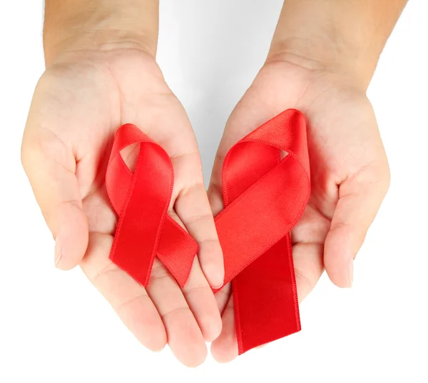 Aids ribbon i händer isolerad på vit — Stockfoto