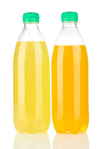 Botellas con bebidas sabrosas, aisladas en blanco —  Fotos de Stock