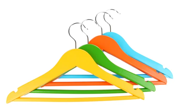 Cabides de roupas coloridas isolados em branco — Fotografia de Stock