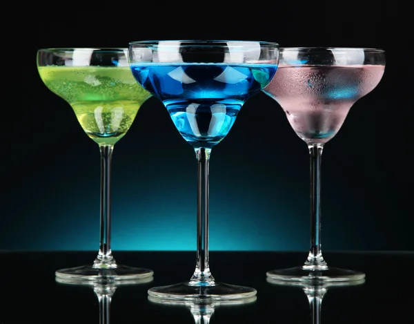 Cocktails on dark color background — Stock Photo, Image