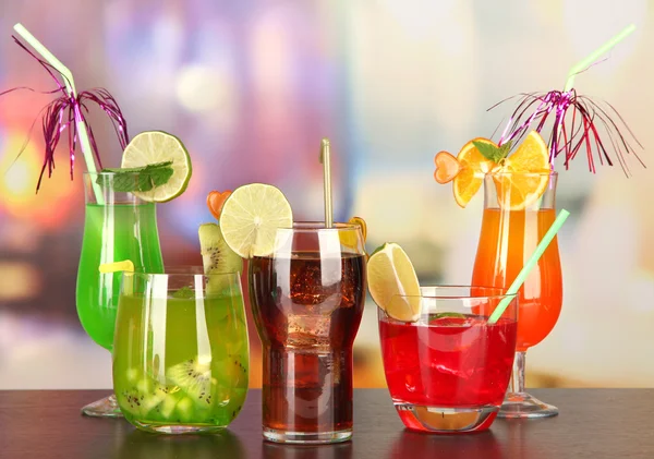 Set of different drinks on bright background — Stock Photo, Image