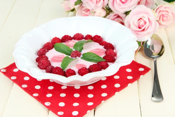 Sweet cream soup with fresh raspberry and sour cheese, on light background — Stock Photo, Image