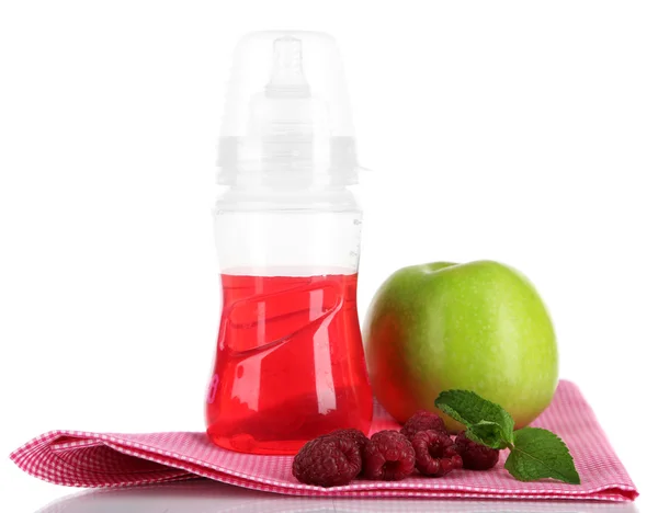 Vruchten en baby fles met compote op servet geïsoleerd op wit — Stockfoto