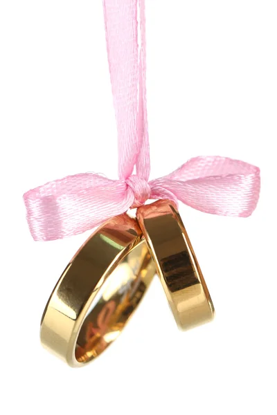 Wedding rings tied with ribbon isolated on white — Stock Photo, Image