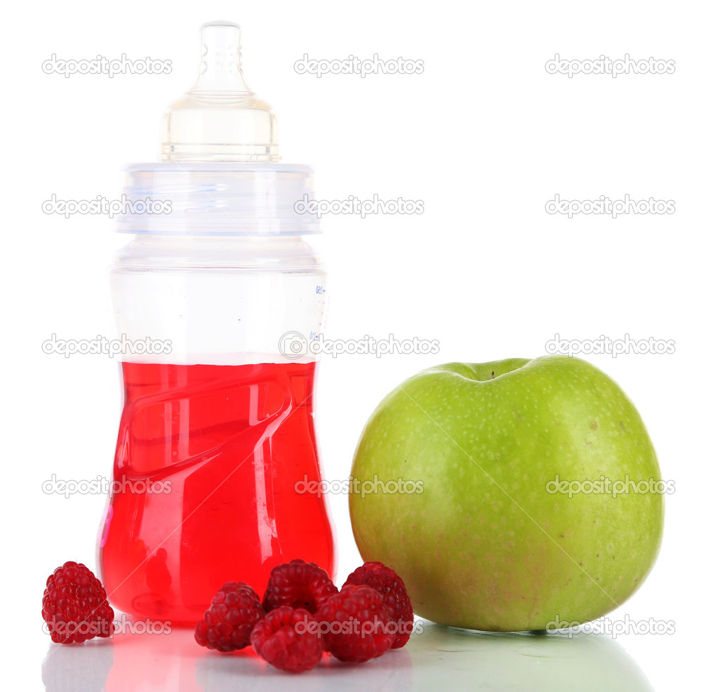 Fruits and baby bottle with compote isolated on white