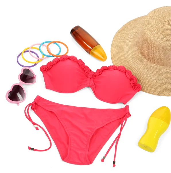 Swimsuit and beach items isolated on white — Stock Photo, Image