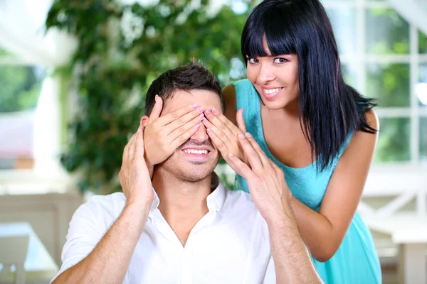 Beautiful young romantic couple in cafe — Stock Photo, Image