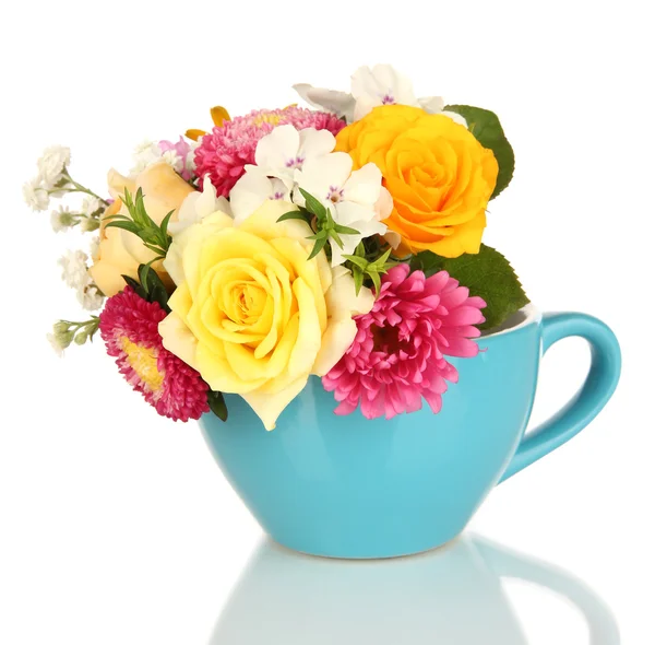 Beautiful bouquet of bright flowers in color mug, isolated on white — Stock Photo, Image