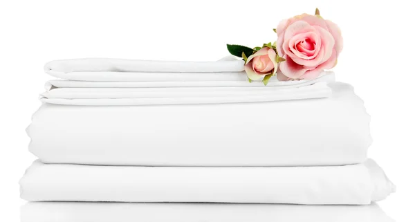 Montón de sábanas limpias aisladas en blanco —  Fotos de Stock