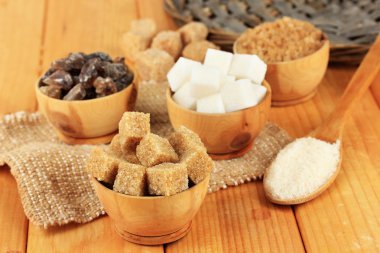 Different types of sugar on table close-up