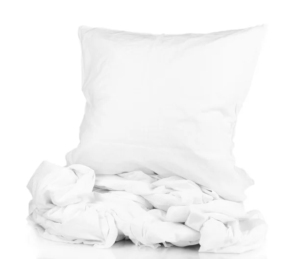 Rumpled bedding sheets and pillow isolated on white — Stock Photo, Image