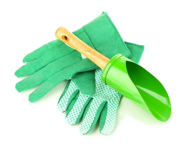 Pequeña pala de jardinería y guantes aislados en blanco — Foto de Stock