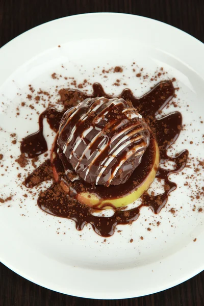Chocolate dessert on big plate close up — Stock Photo, Image