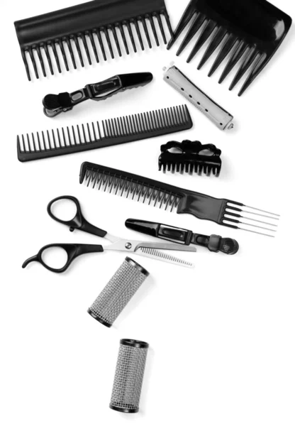 Ferramentas de cabeleireiro profissionais isoladas em branco — Fotografia de Stock