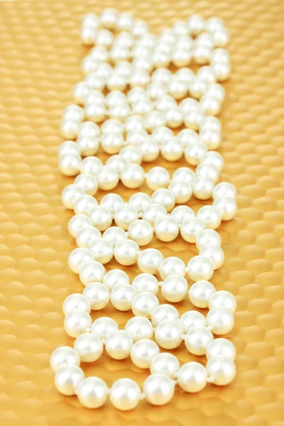 Color beads on bright background, close-up — Stock Photo, Image