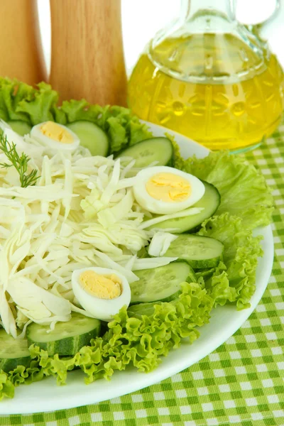 Delicious salad with eggs, cabbage and cucumbers — Stock Photo, Image