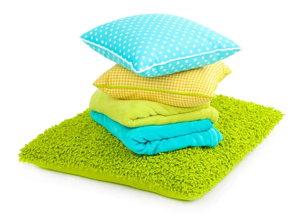 Colorful pillows and plaids isolated on white — Stock Photo, Image