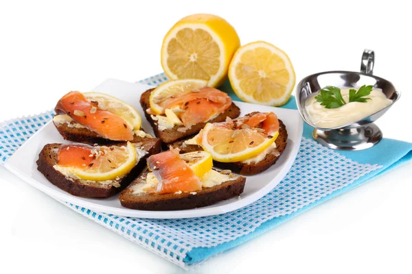 Sandwiches de salmón en plato aislado sobre blanco — Foto de Stock