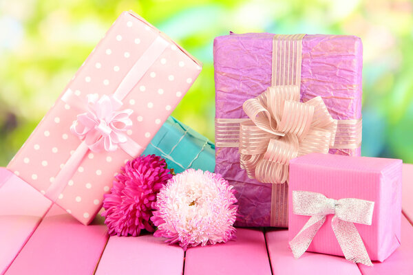 Gifts and flowers, on nature background