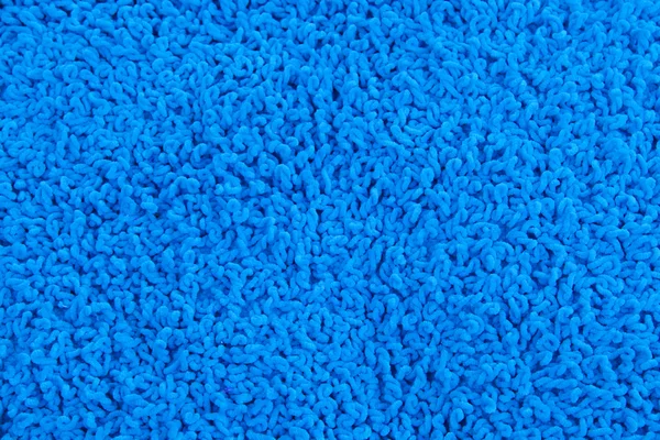 Fleecy travesseiro azul close-up fundo — Fotografia de Stock