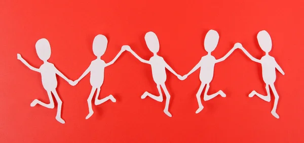 Paper people in social network concept on red background — Stock Photo, Image