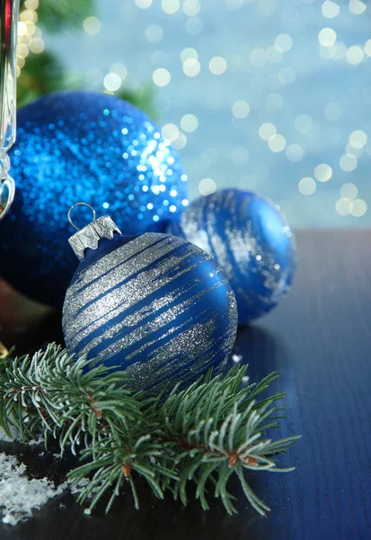 Composition with Christmas decorations and two champagne glasses, on bright background — Stock Photo, Image