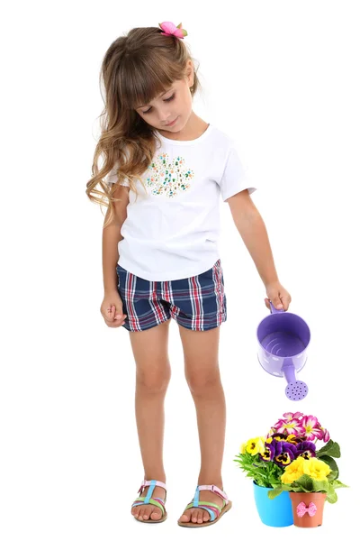 Little girl watering beautiful flowers isolated on white — Stock Image Little girl watering beautiful flowers isolated on white Stock Picture